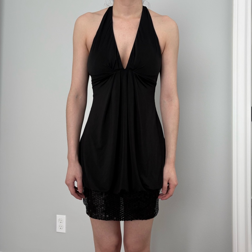 Black mini dress with halter neck and sequin skirt